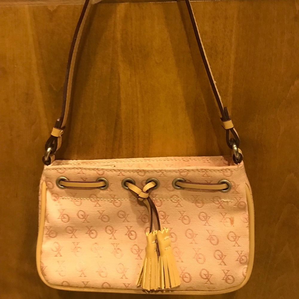 Light pink OX bag with beige tassels